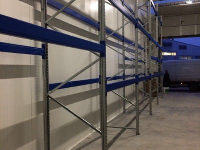 Delivery and installation of new warehouse equipment in the Sonel warehouse. Console shelving system for warehouse. Warehouse shelves and equipment VVN.LV 3